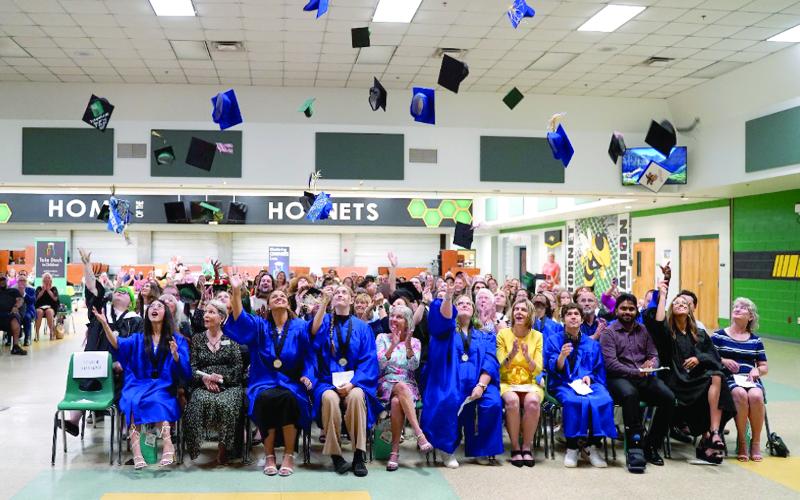 Take Stock in Children of Nassau graduates celebrate at a ceremony in May. 